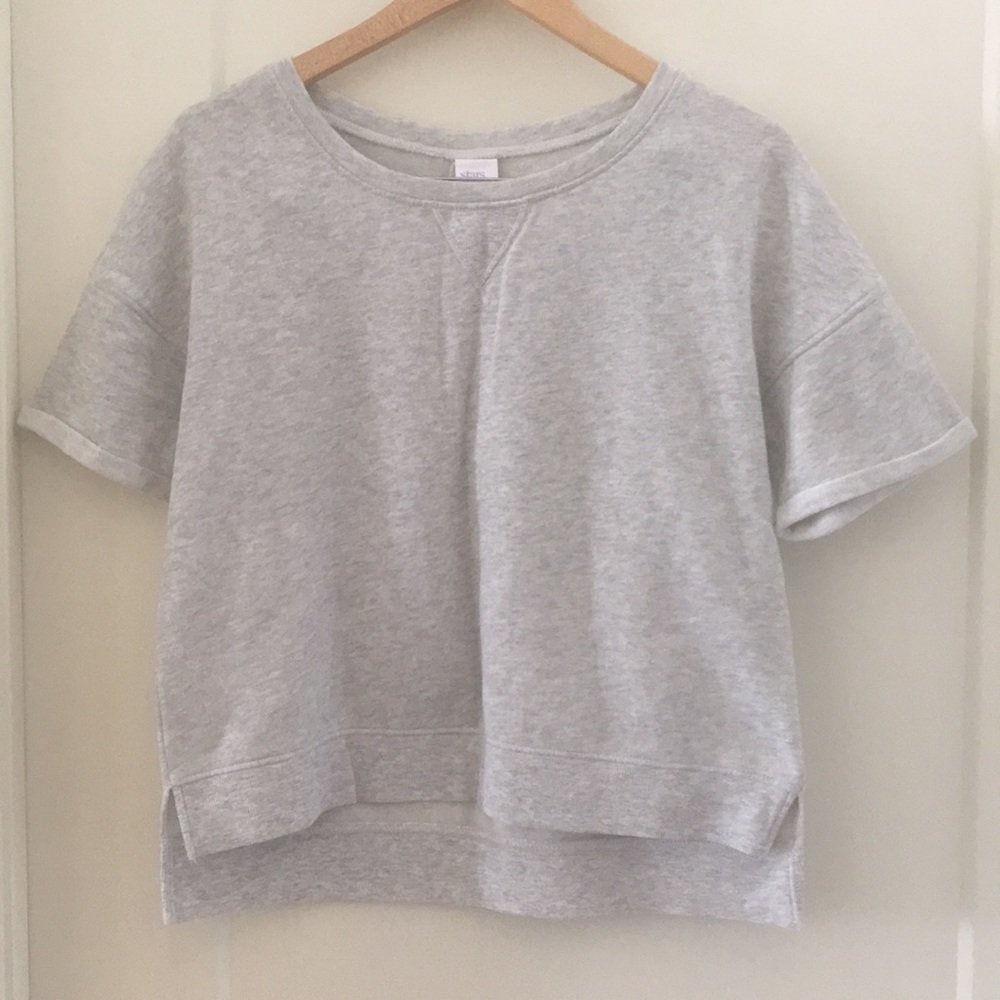 Stars above roll sleeve sweatshirt top